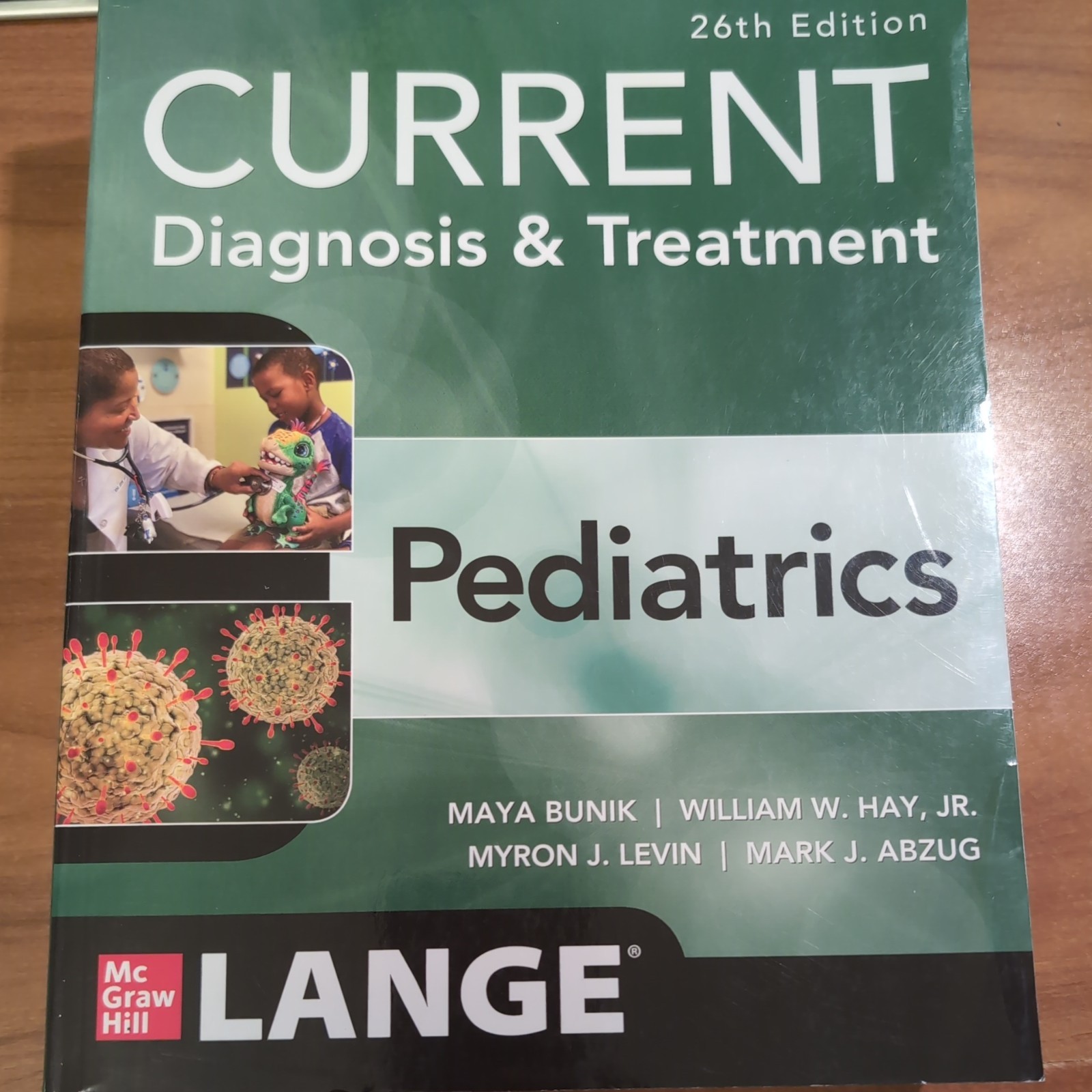 Current Diagnosis & Treatment Pediatrics, 26th Edition Paperback Good